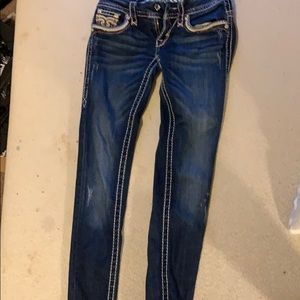 Emborded  dark jeans
